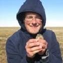 Tim holding a Plover chick.